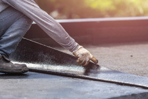 Professional Waterproofing technician working in West Long Branch, NJ